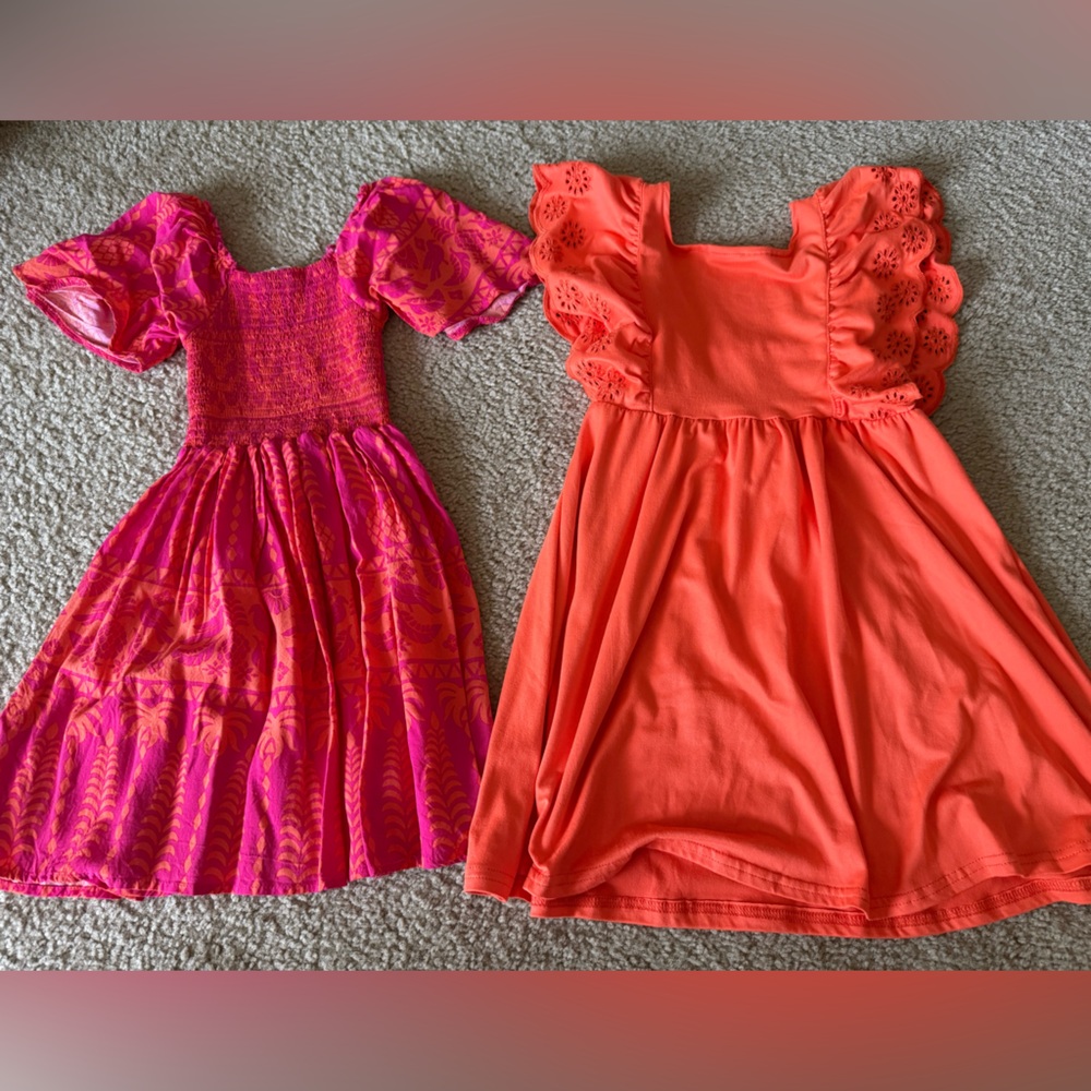 (2) girls dresses like new worn once pink and orange size 7  brand btween